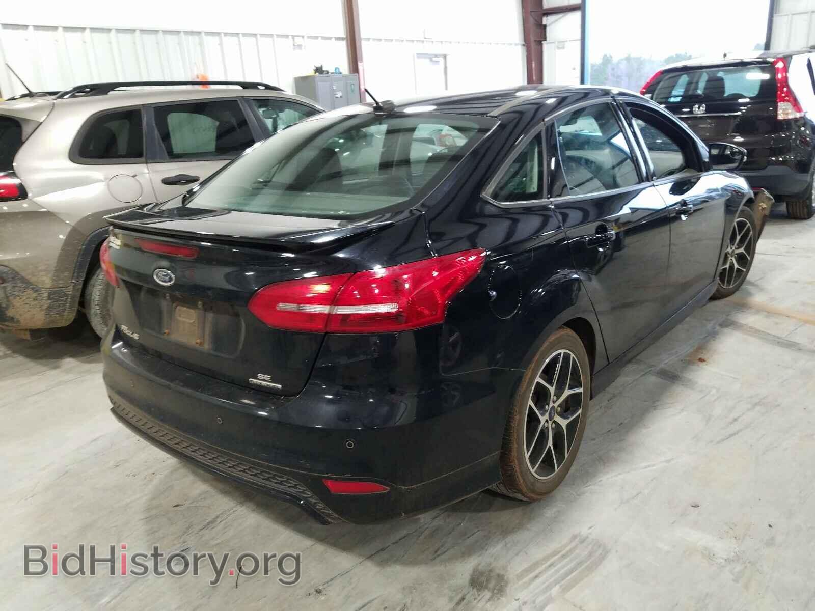 2016 FORD FOCUS - VIN: 1FADP3F21GL389463 - Photo 4