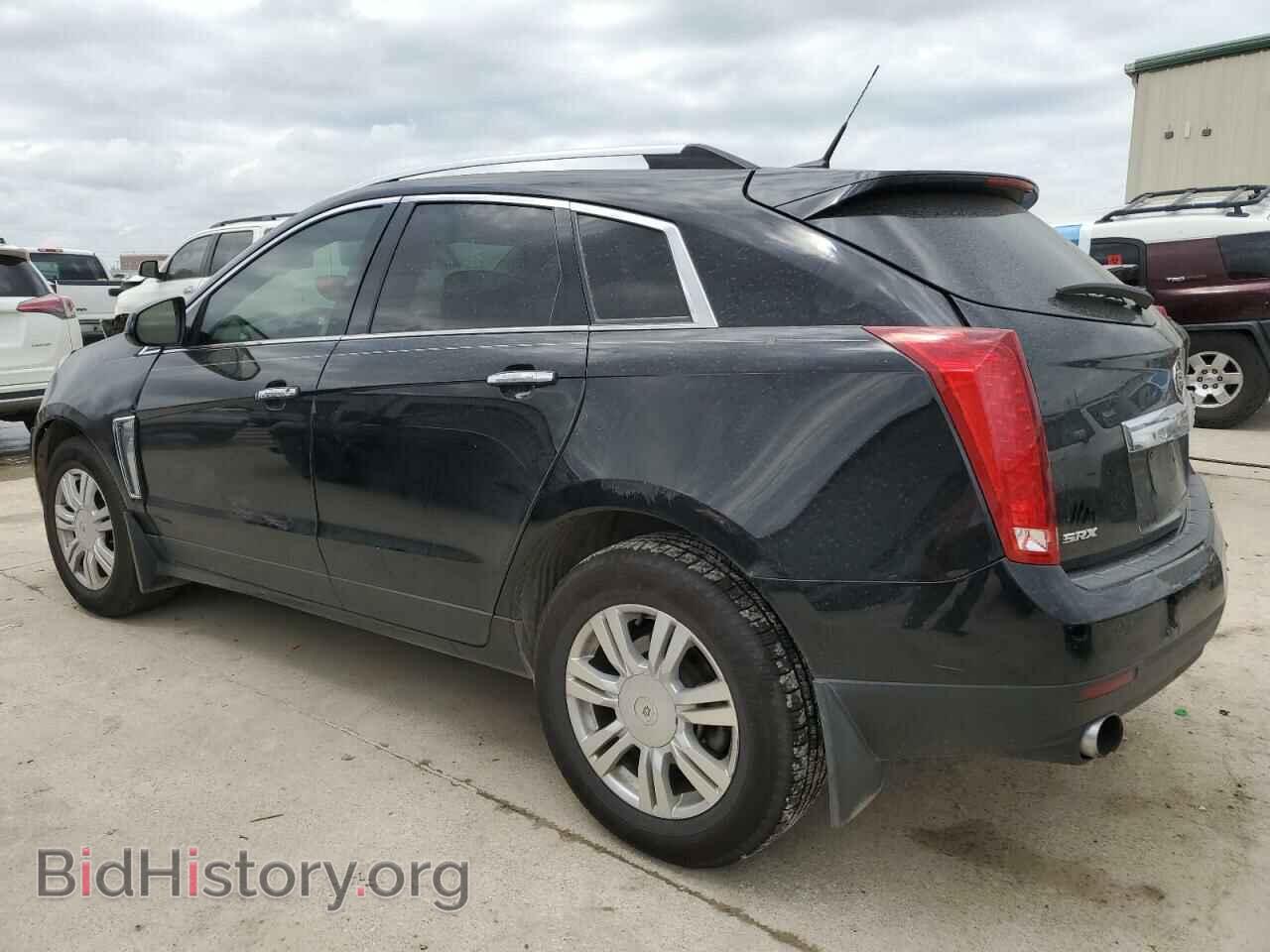 2013 CADILLAC SRX - VIN: 3GYFNCE31DS509121 - Фото 2