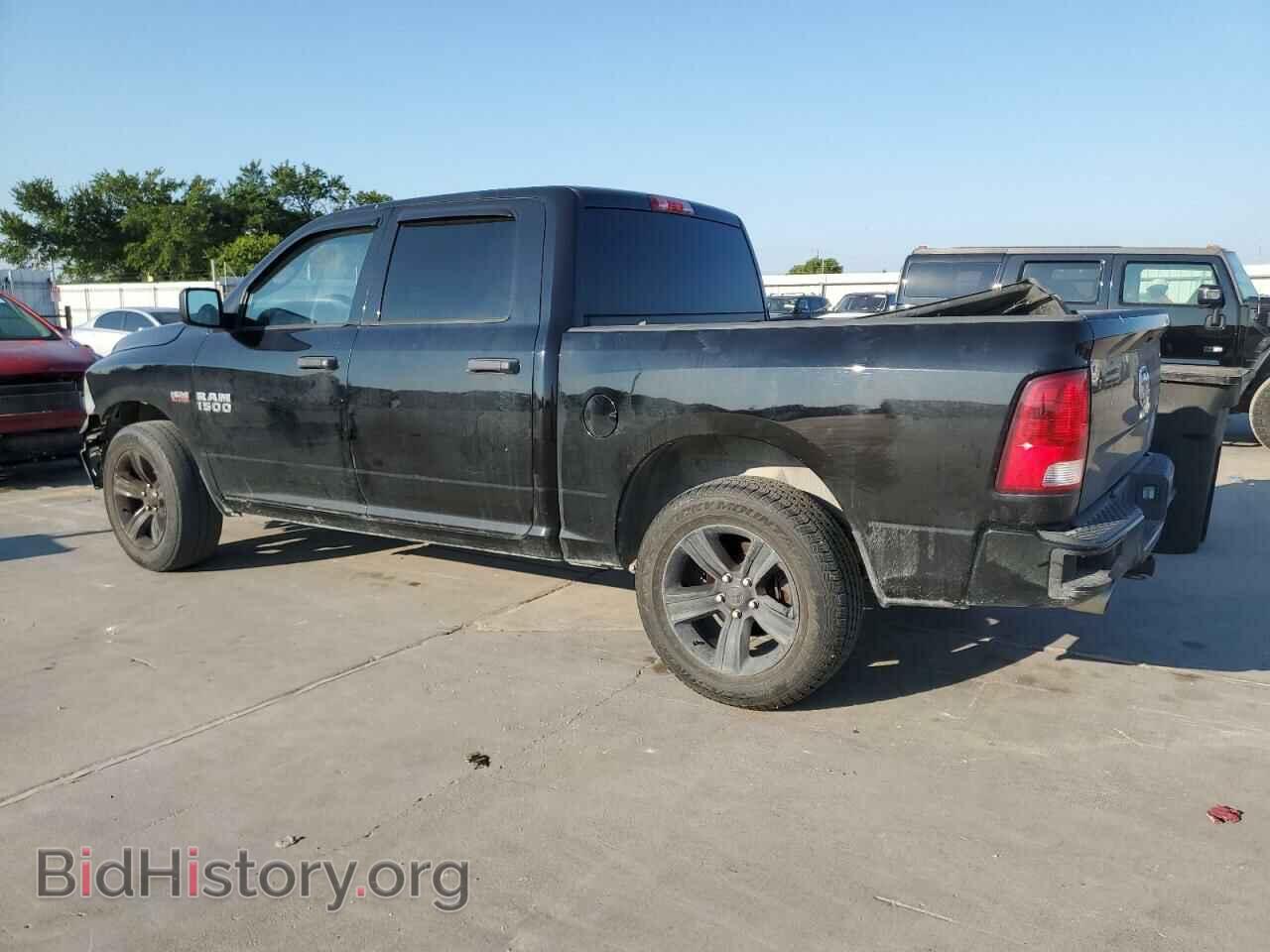 2014 RAM 1500 - VIN: 3C6RR6KT9EG201509 - Фото 2