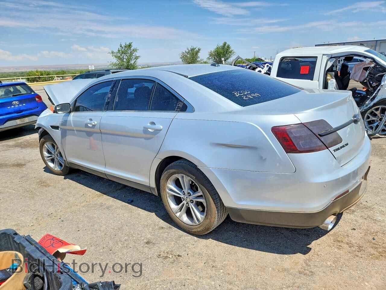 2014 Ford TAURUS (VIN 1FAHP2E80EG162899) — photo 2 of 13