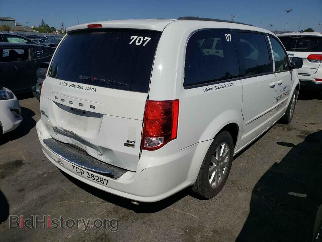 2014 DODGE CARAVAN - VIN: 2C4RDGCG2ER401849 - Фото 4