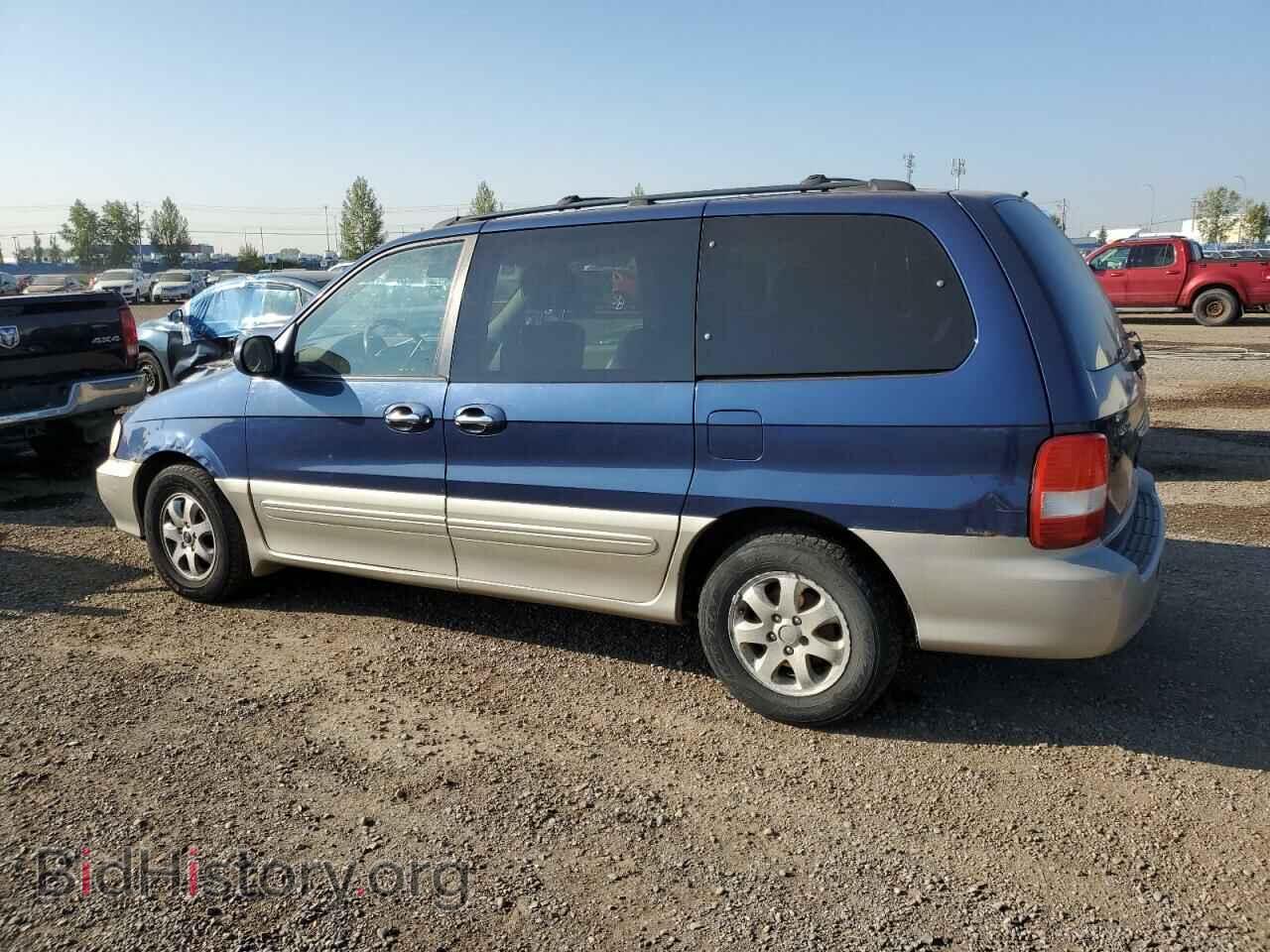 2004 KIA All Models - VIN: KNDUP131746529391 - Photo 2