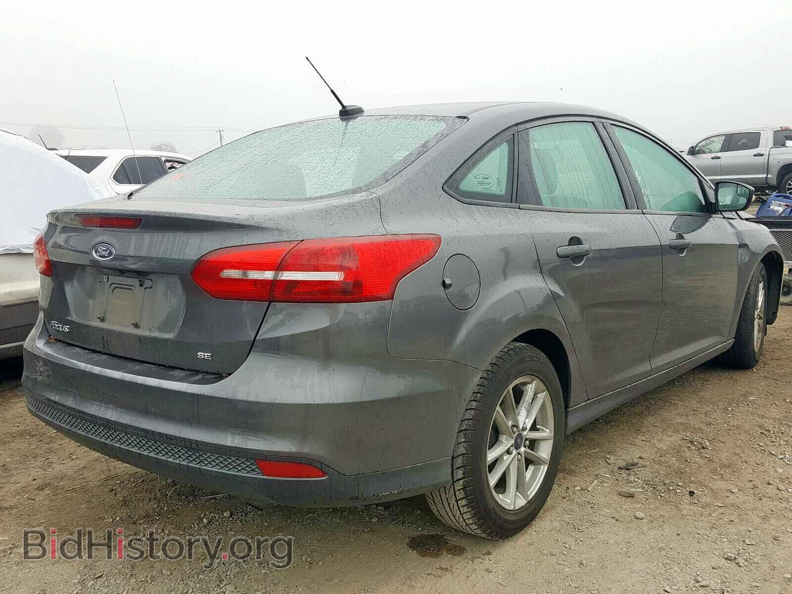 2015 FORD FOCUS - VIN: 1FADP3F22FL316391 - Photo 4