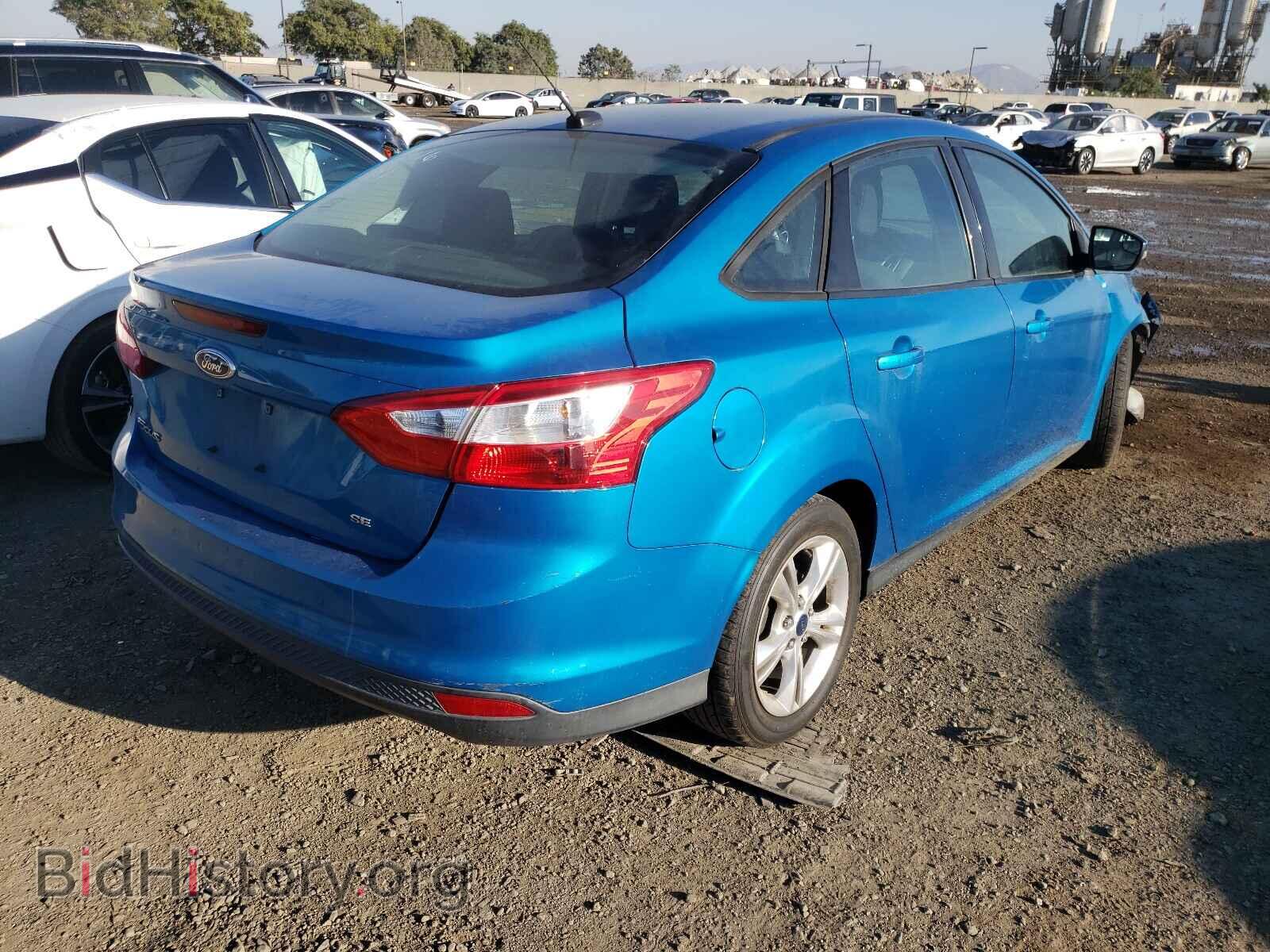 2014 FORD FOCUS - VIN: 1FADP3F21EL198610 - Photo 4