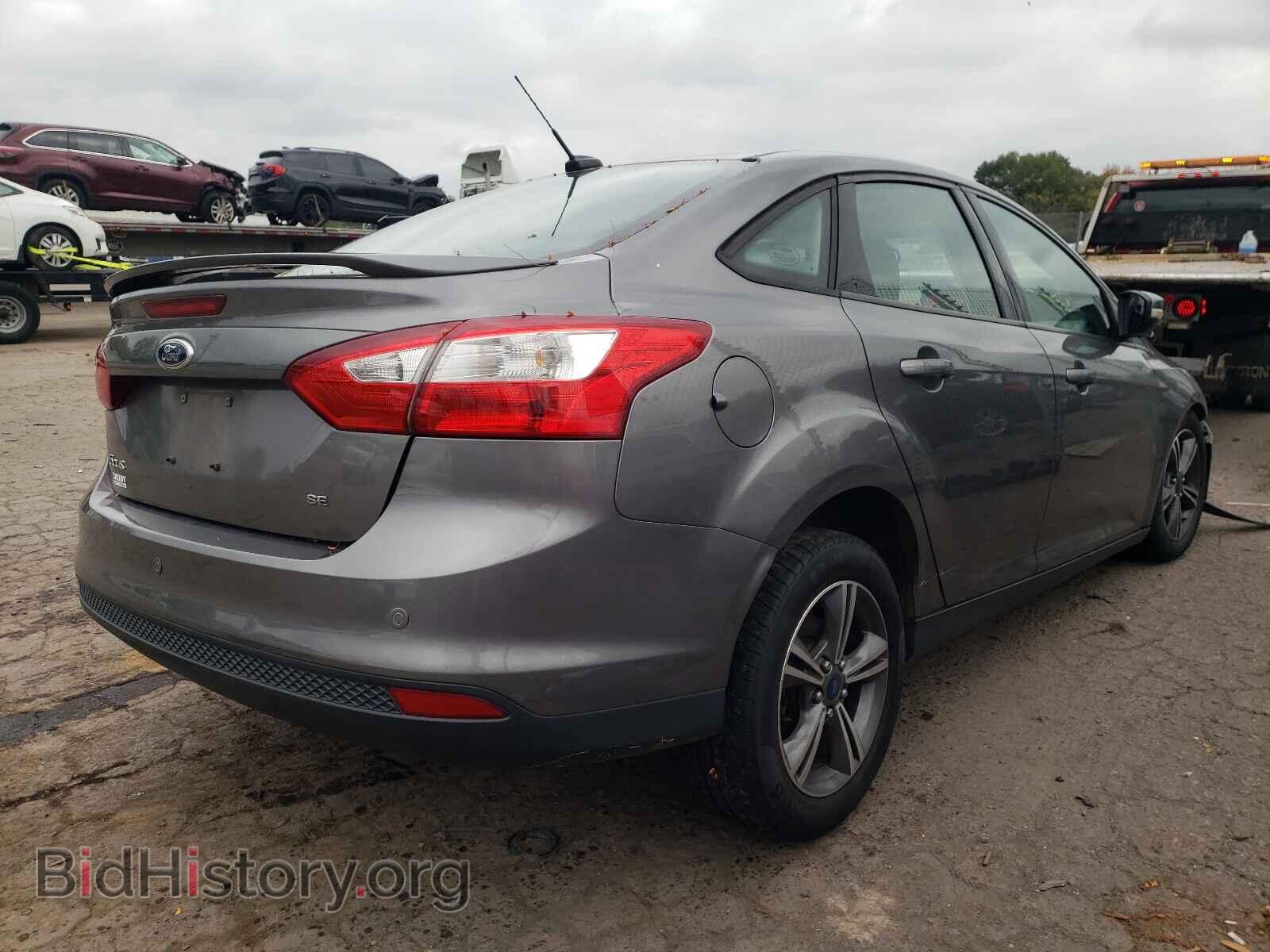 2014 FORD FOCUS - VIN: 1FADP3F23EL437008 - Photo 4