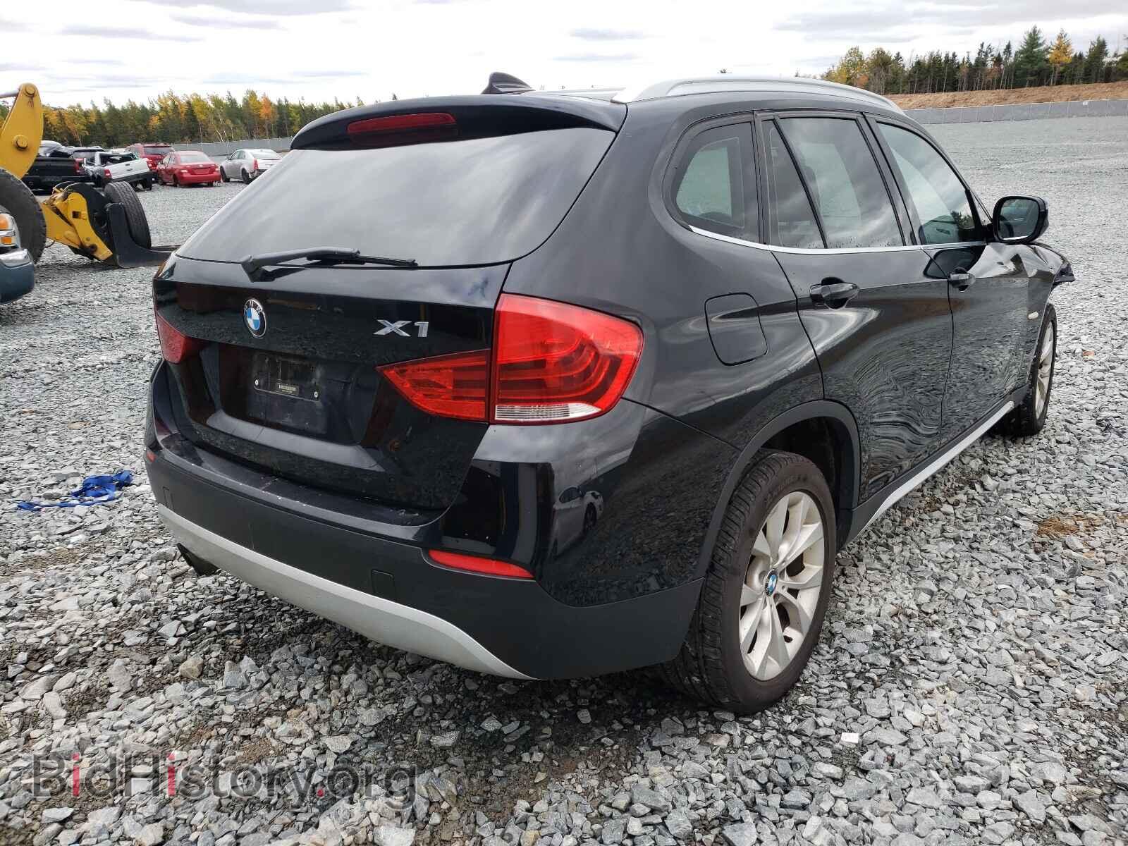 2012 BMW X1 - VIN: WBAVL1C5XCVR79668 - Фото 4