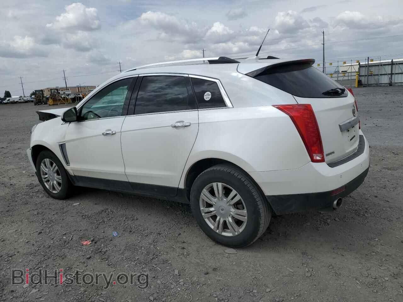 2014 CADILLAC SRX - VIN: 3GYFNBE37ES566404 - Фото 2