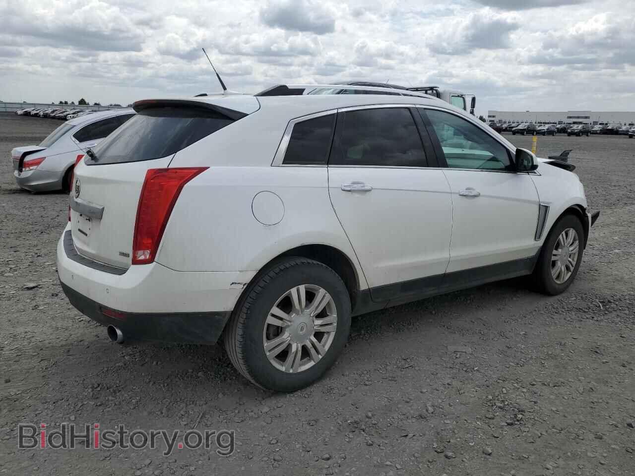 2014 CADILLAC SRX - VIN: 3GYFNBE37ES566404 - Фото 3