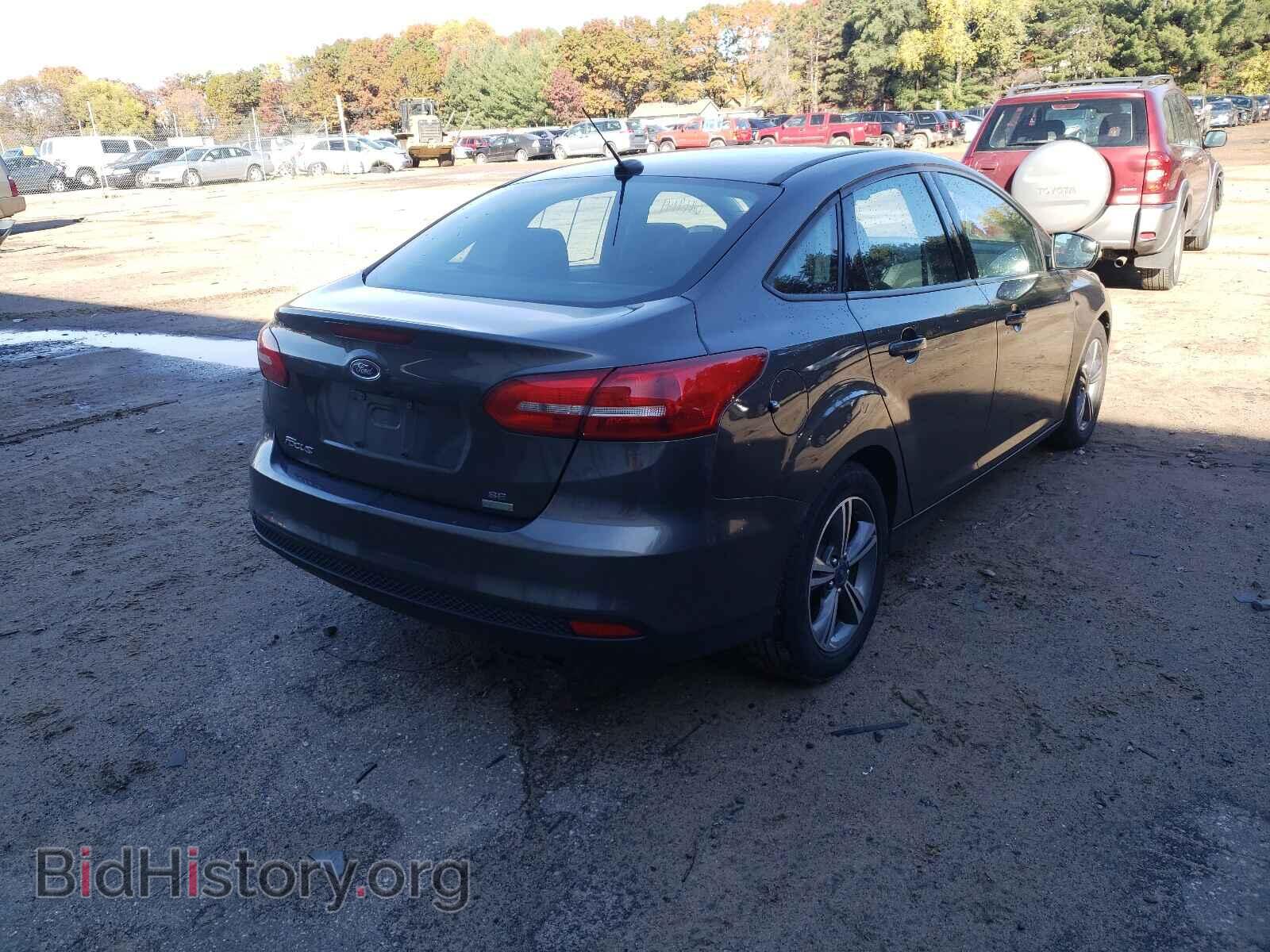 2017 FORD FOCUS - VIN: 1FADP3FE4HL261696 - Photo 4