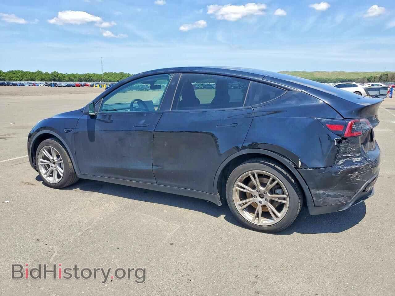 2023 TESLA MODEL Y - VIN: 7SAYGDED5PF932811 - Photo 2