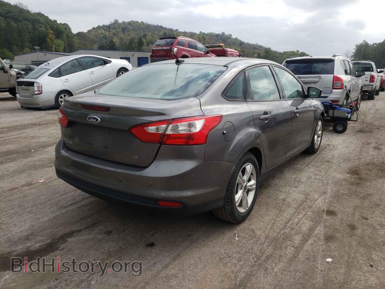 2014 FORD FOCUS - VIN: 1FADP3F29EL106093 - Photo 4
