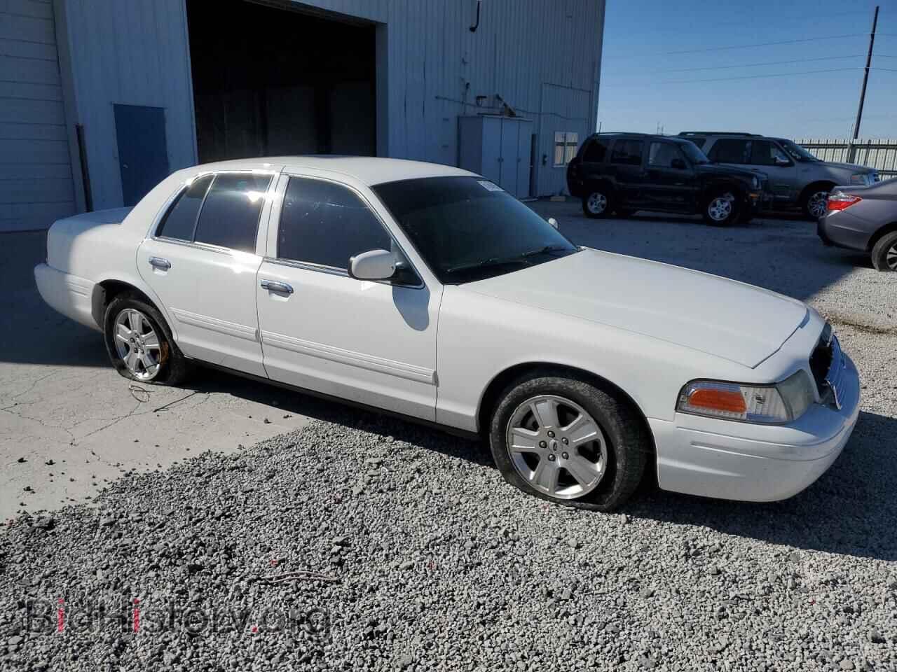 2011 FORD CROWN VIC - VIN: 2FABP7EV5BX133123 - Фото 4