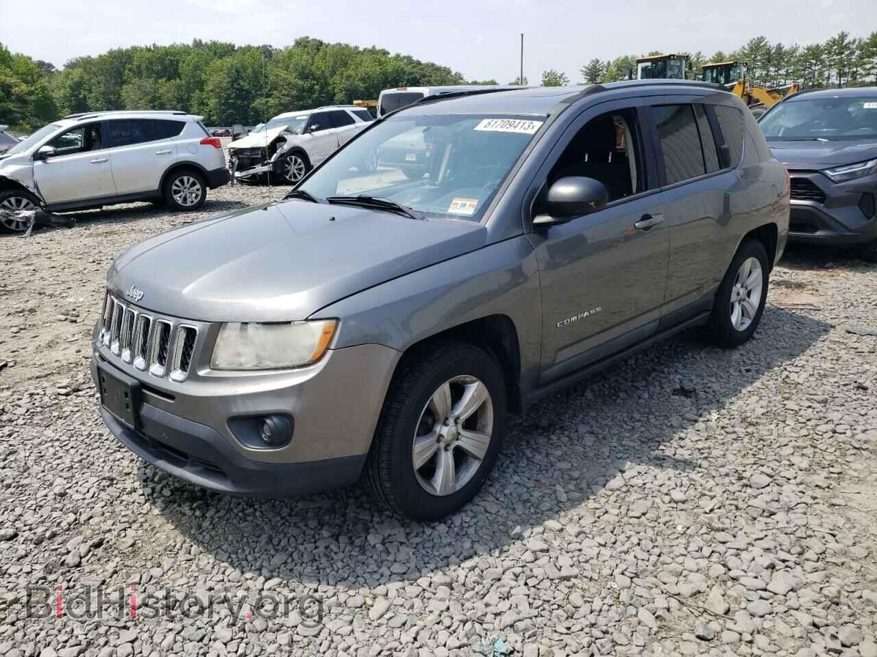 Photo 1J4NF1FBXBD239144 - JEEP COMPASS 2011