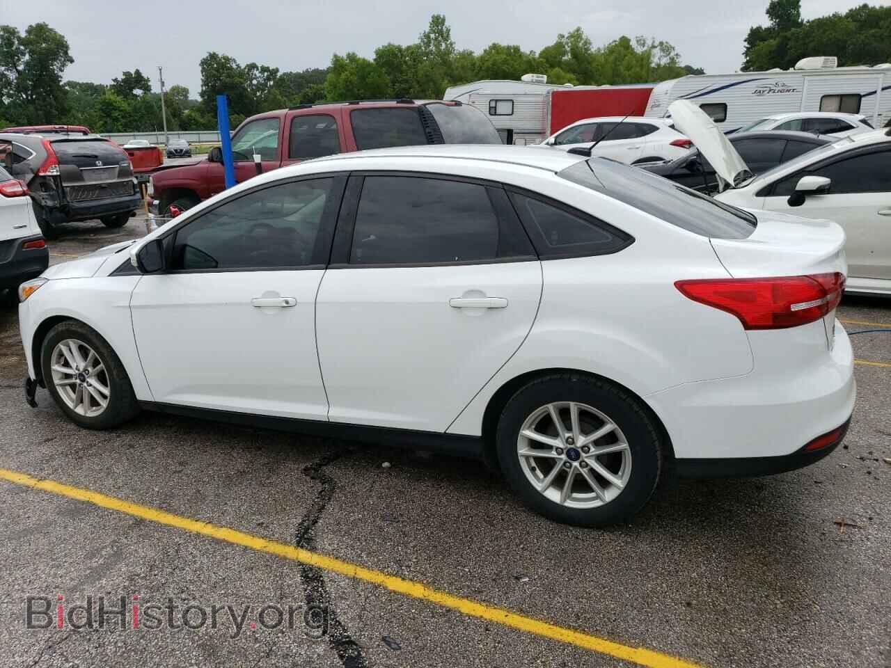 2016 FORD FOCUS - VIN: 1FADP3F21GL387471 - Фото 2