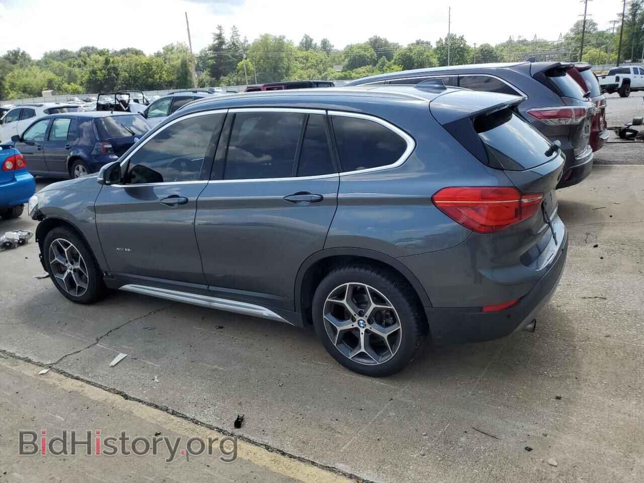 2016 BMW X1 - VIN: WBXHT3C37GP885593 - Фото 2