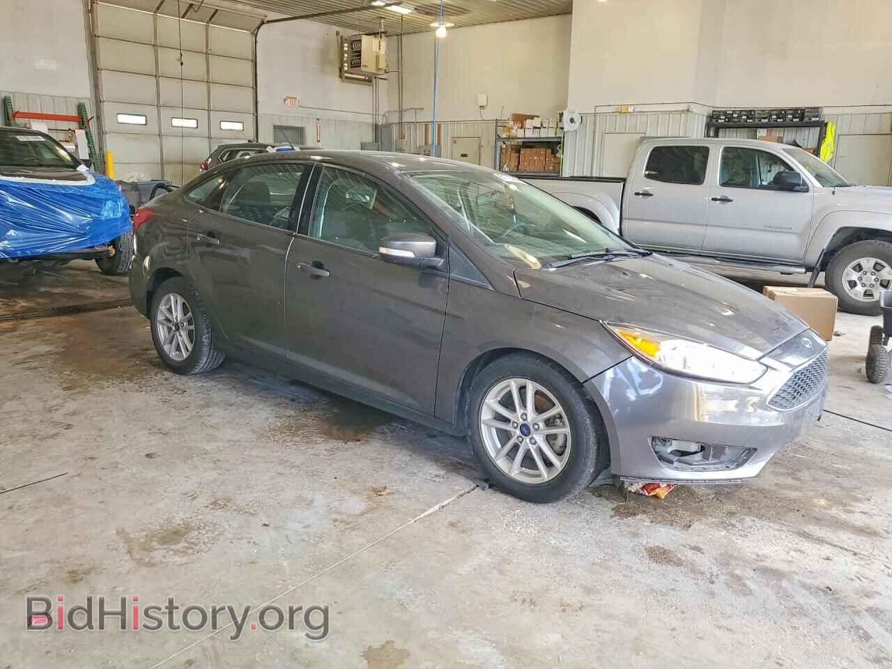 2017 FORD FOCUS - VIN: 1FADP3F21HL318975 - Photo 4
