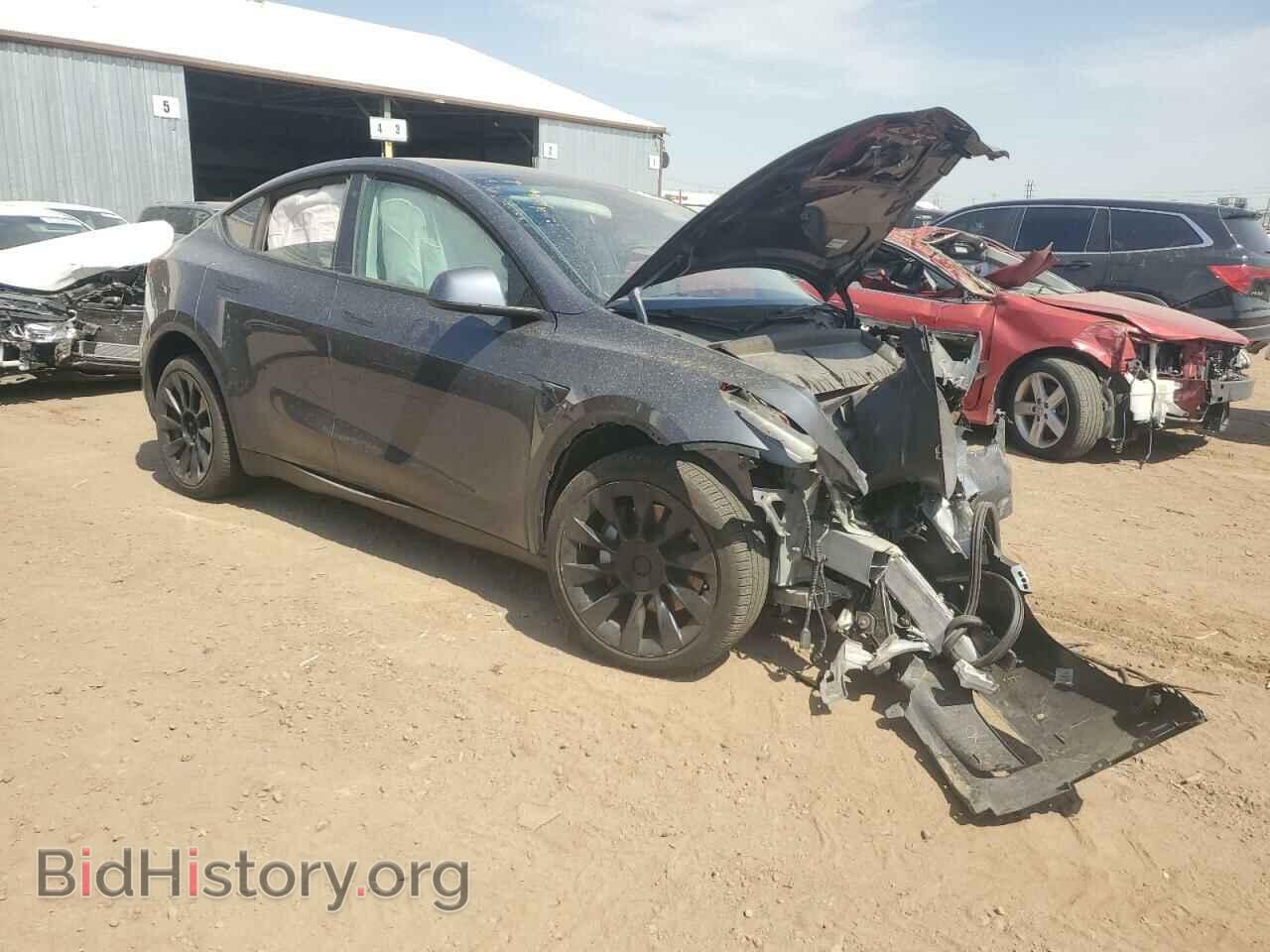 2022 TESLA MODEL Y - VIN: 7SAYGDEE2NF387382 - Photo 4