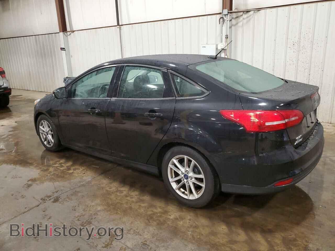 2016 FORD FOCUS - VIN: 1FADP3F22GL261121 - Фото 2