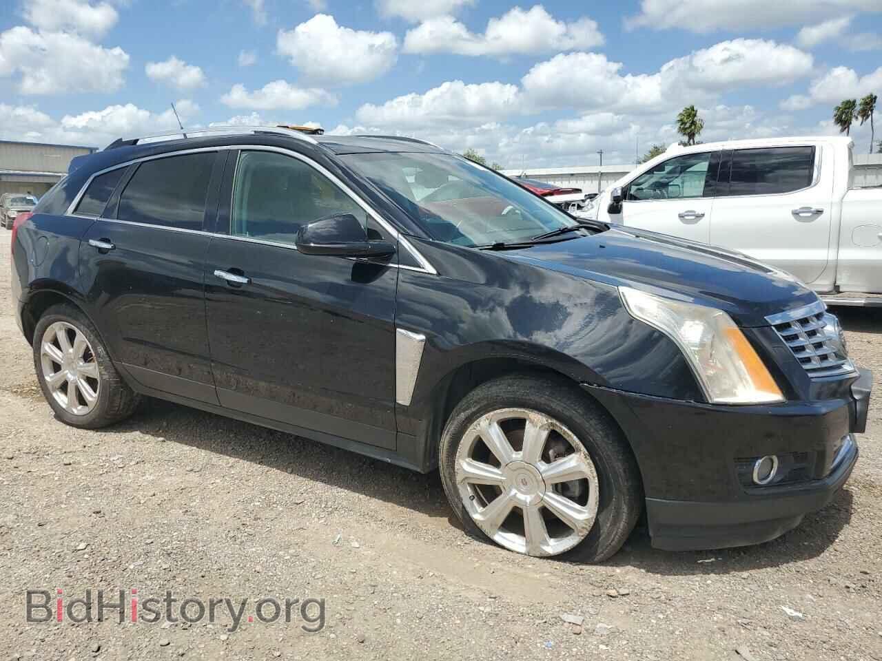 2014 CADILLAC SRX - VIN: 3GYFNCE37ES581586 - Фото 4