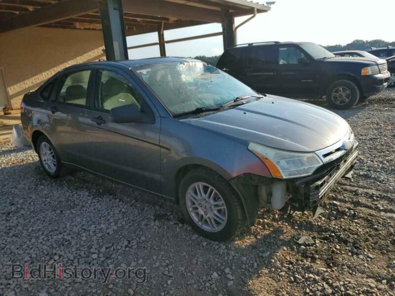 2011 Ford FOCUS (VIN 1FAHP3FN9BW141108) — photo 4 of 13