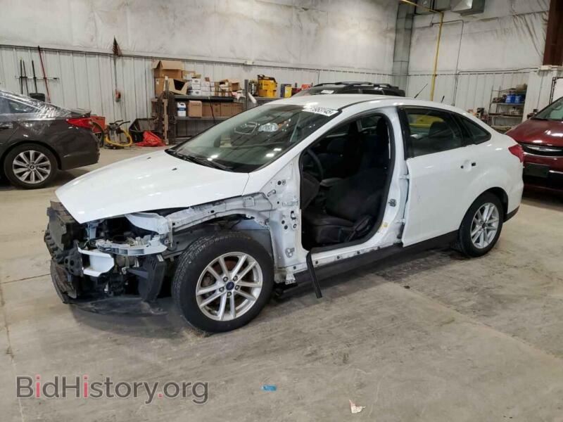 2017 Ford FOCUS SE (VIN 1FADP3F2XHL331773) — photo 1 of 14, Copart, damage: front end
