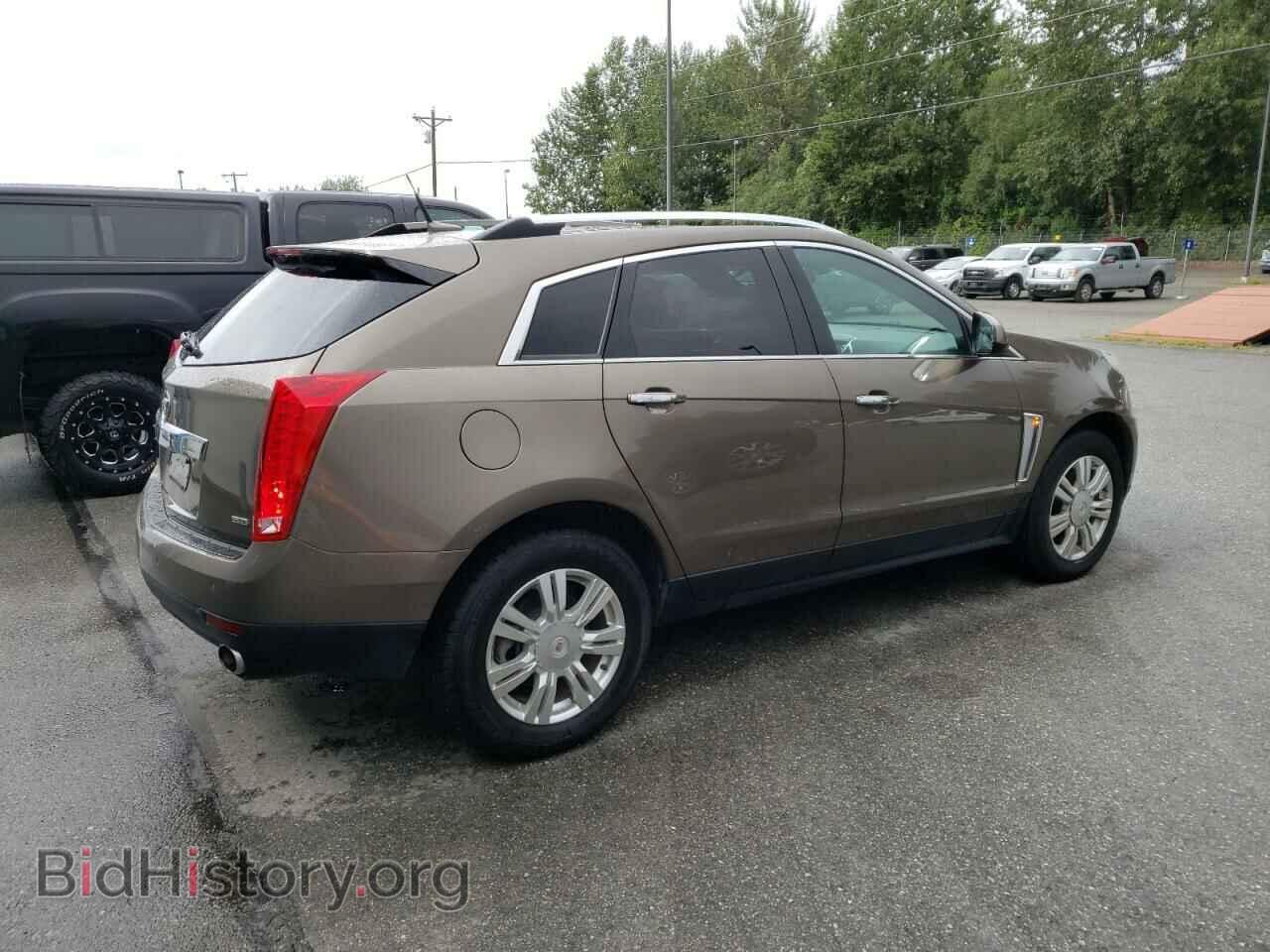 2014 CADILLAC SRX - VIN: 3GYFNEE30ES608557 - Фото 3
