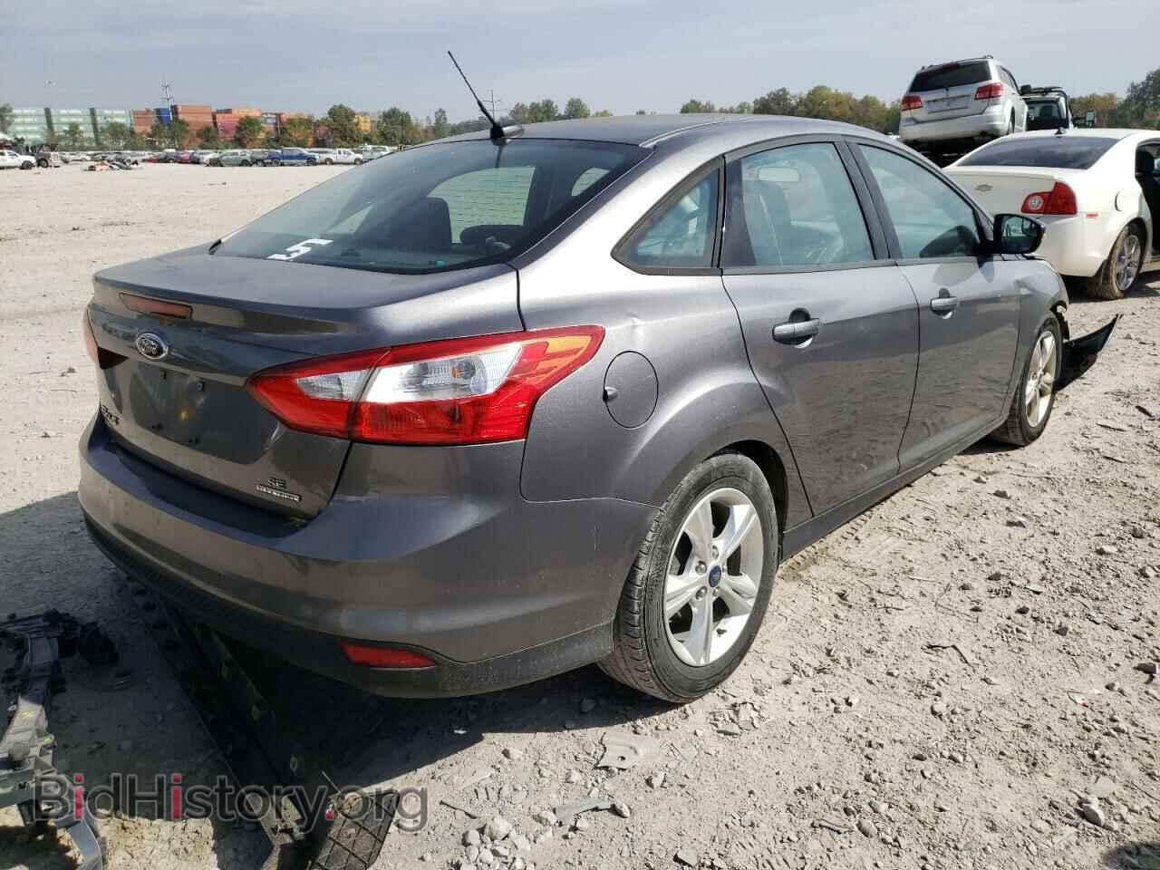 2014 FORD FOCUS - VIN: 1FADP3F20EL129472 - Photo 4