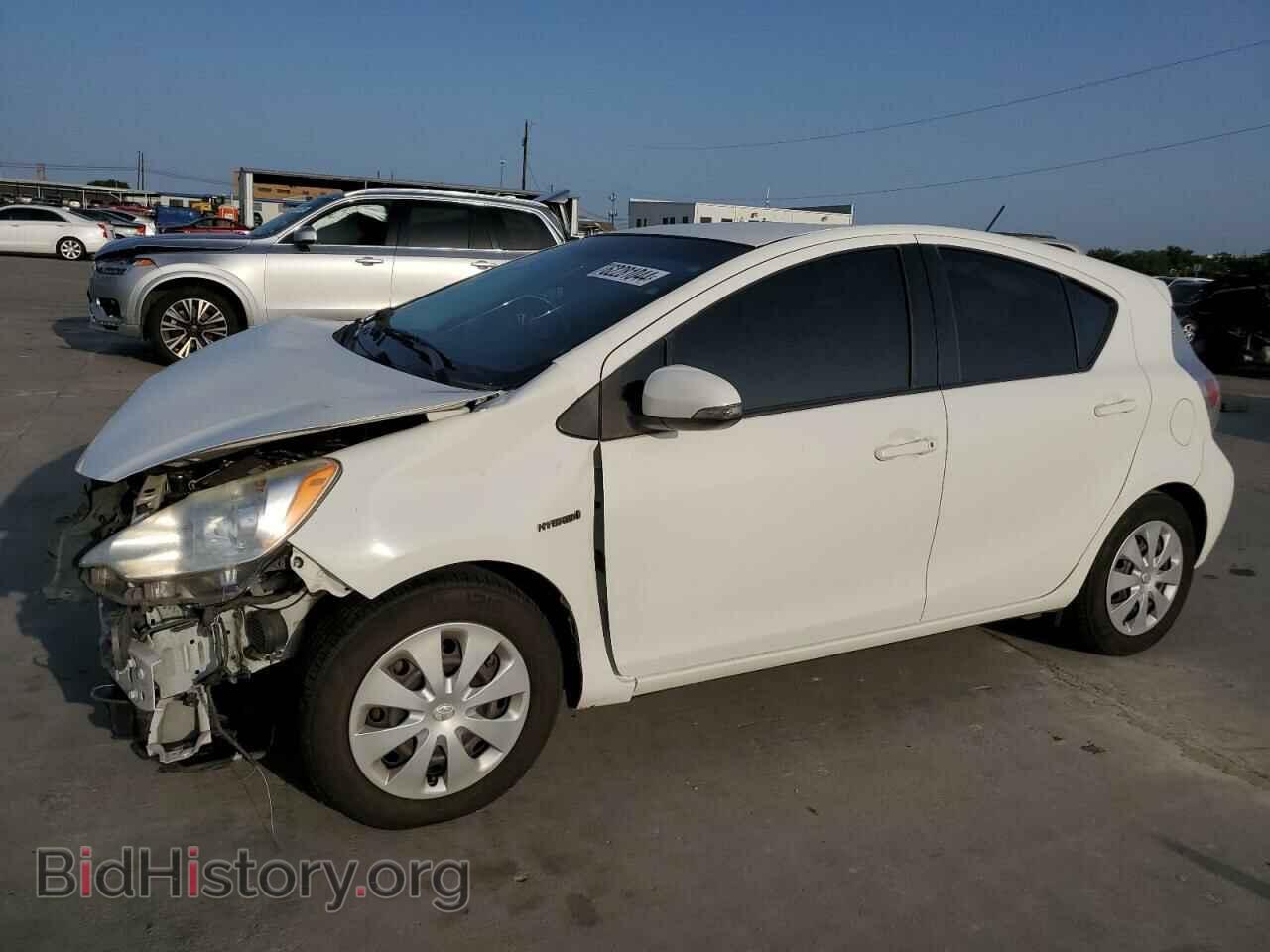Фотография JTDKDTB31C1020973 - TOYOTA PRIUS 2012