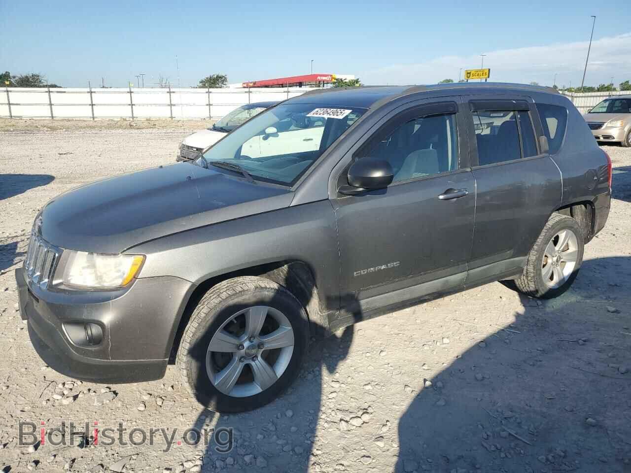 Photo 1J4NF1FB0BD283878 - JEEP COMPASS 2011