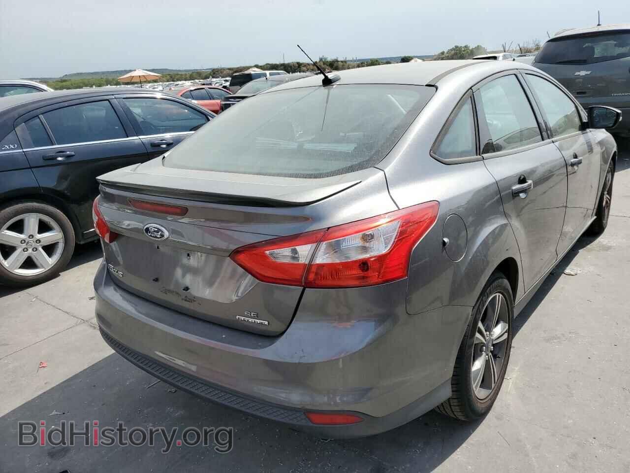 2014 FORD FOCUS - VIN: 1FADP3F20EL348559 - Photo 4