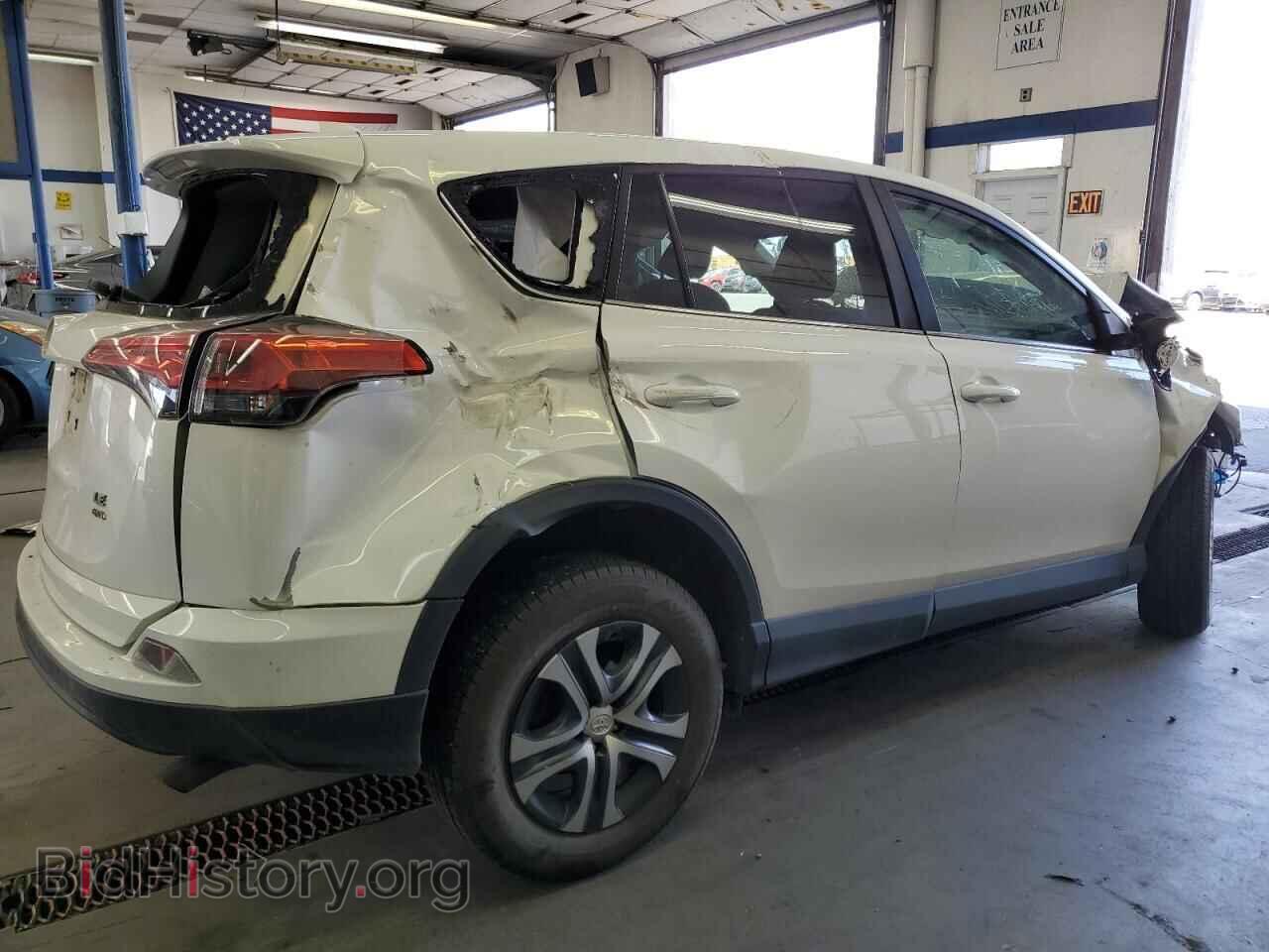 2018 TOYOTA RAV4 - VIN: 2T3BFREV0JW852913 - Фото 3