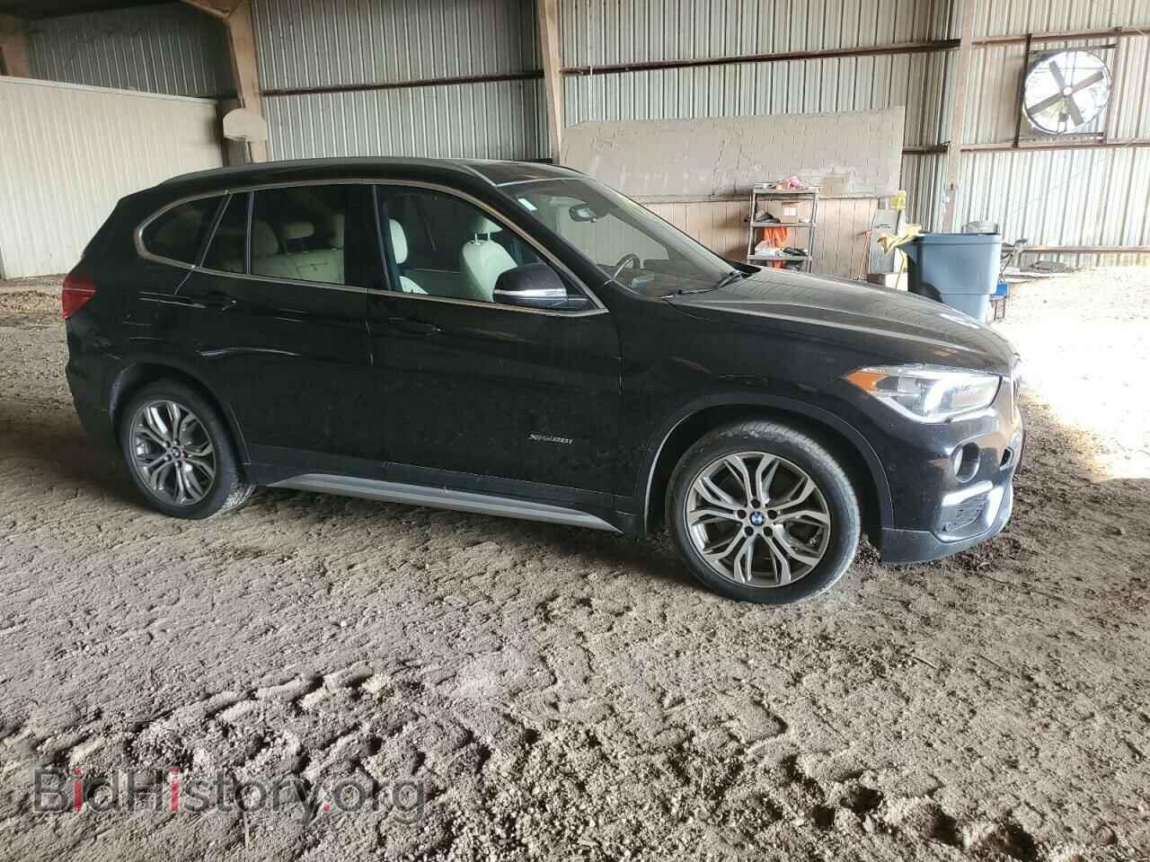 2017 BMW X1 - VIN: WBXHT3Z35H4A53666 - Фото 4