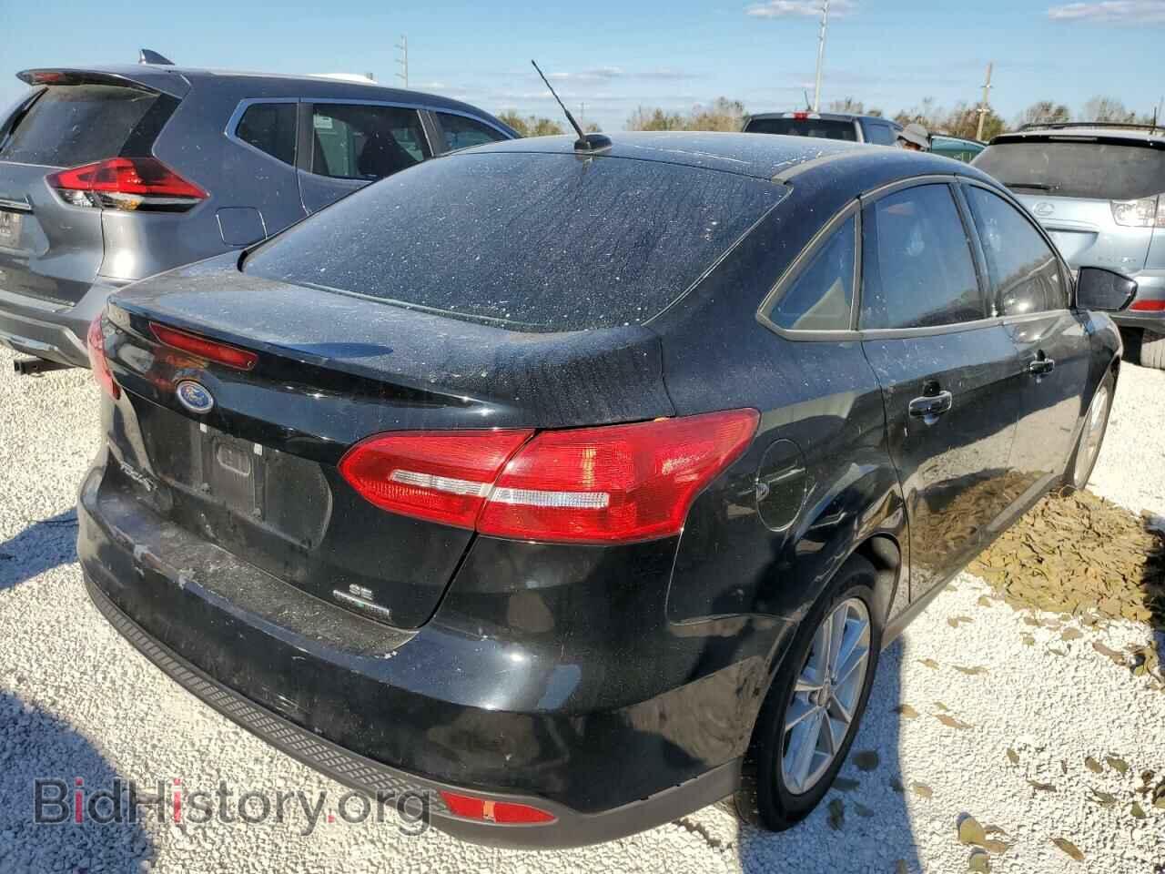 2016 FORD FOCUS - VIN: 1FADP3F24GL232901 - Photo 4