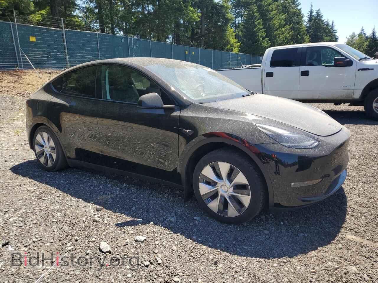 2023 TESLA MODEL Y - VIN: 7SAYGAEEXPF887274 - Photo 4