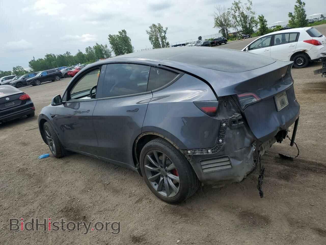 2023 TESLA MODEL Y - VIN: 7SAYGDEE2PF596611 - Photo 2
