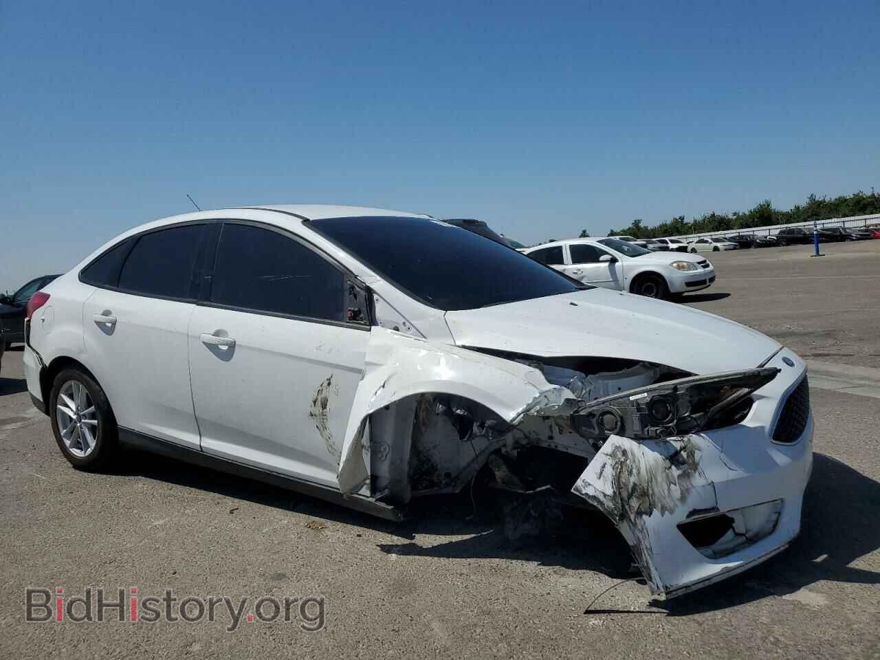 2017 FORD FOCUS - VIN: 1FADP3FE4HL304062 - Photo 4