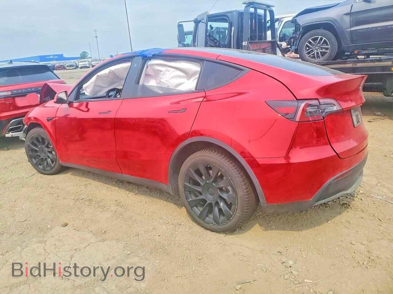 2023 TESLA MODEL Y - VIN: 7SAYGDEE2PF767101 - Photo 2