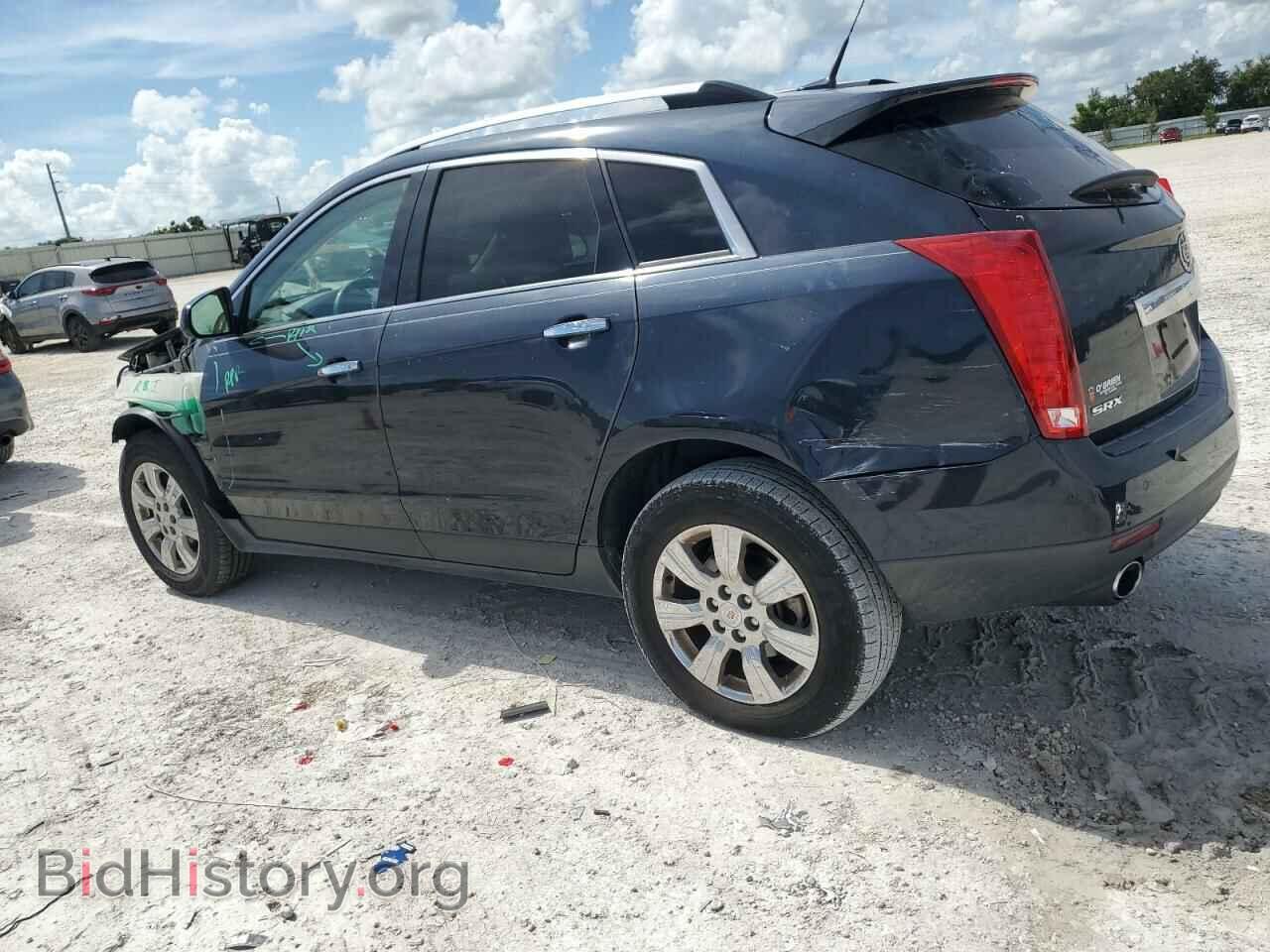 2014 CADILLAC SRX - VIN: 3GYFNBE36ES658295 - Фото 2