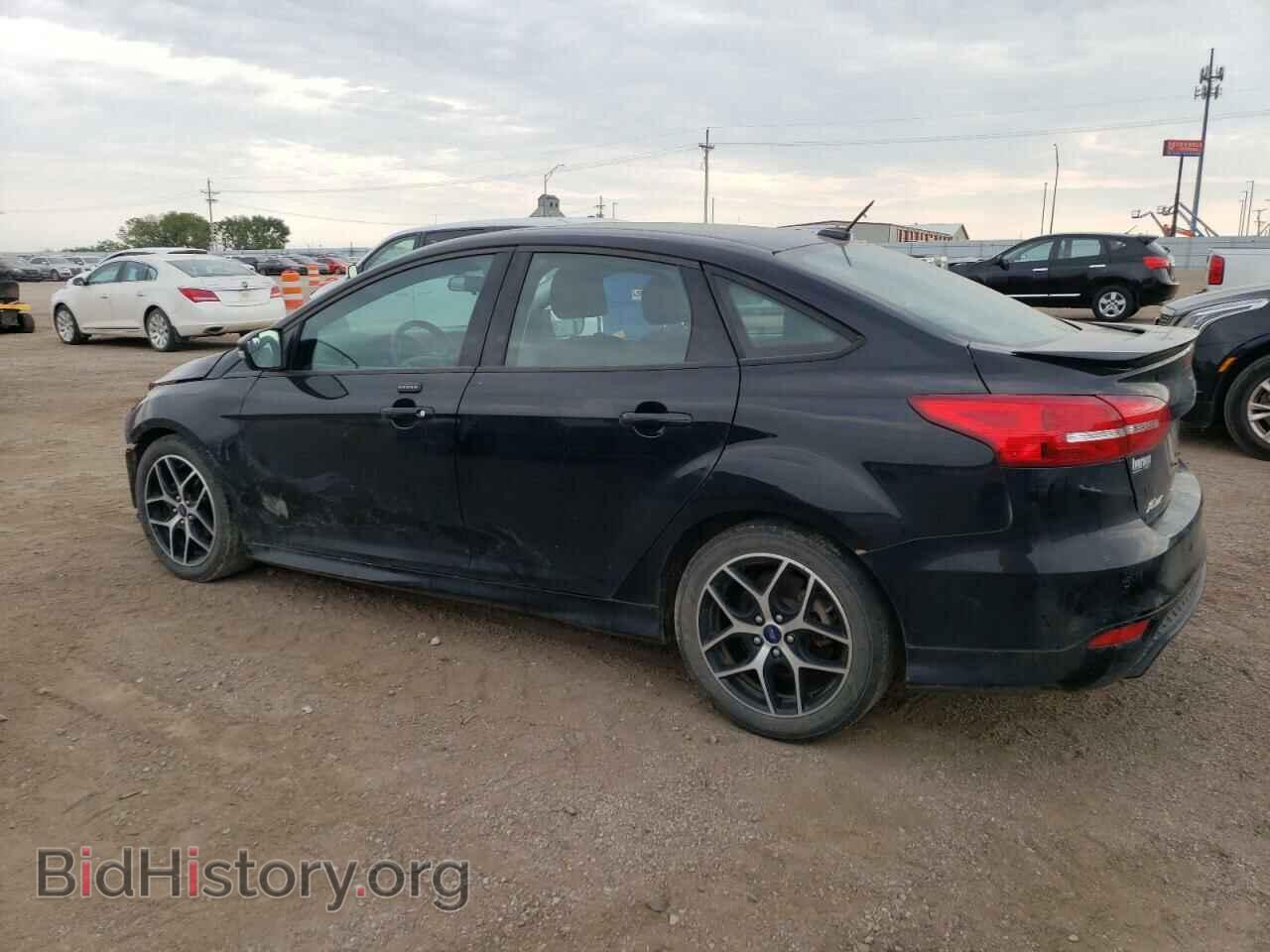 2016 FORD FOCUS - VIN: 1FADP3F2XGL391762 - Фото 2