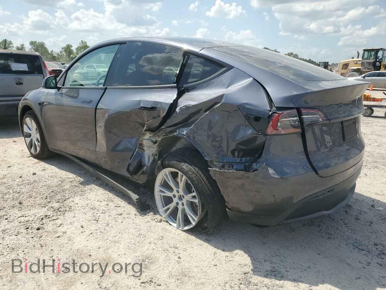 2023 TESLA MODEL Y - VIN: 7SAYGDED2PF943071 - Фото 2