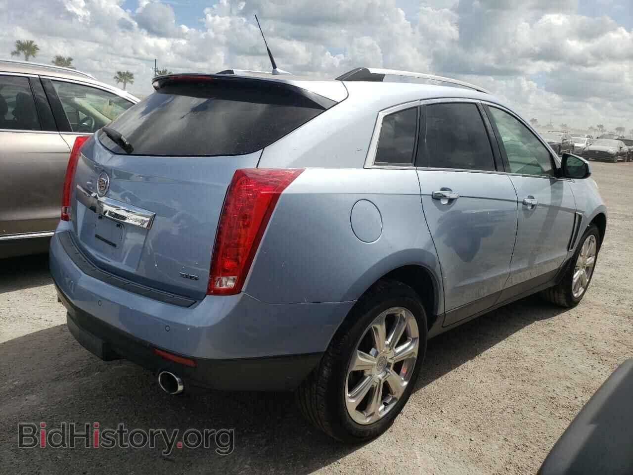 2013 CADILLAC SRX - VIN: 3GYFNDE37DS559270 - Фото 4