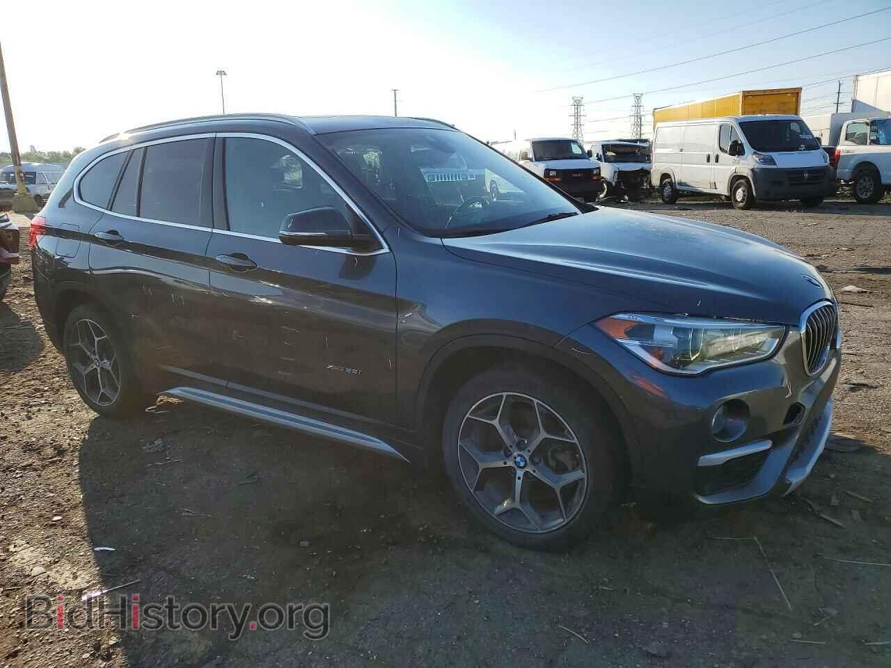 2017 BMW X1 - VIN: WBXHT3Z3XH4A65618 - Фото 4