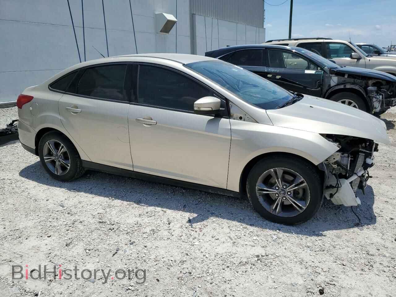 2017 FORD FOCUS - VIN: 1FADP3FE8HL302105 - Photo 4