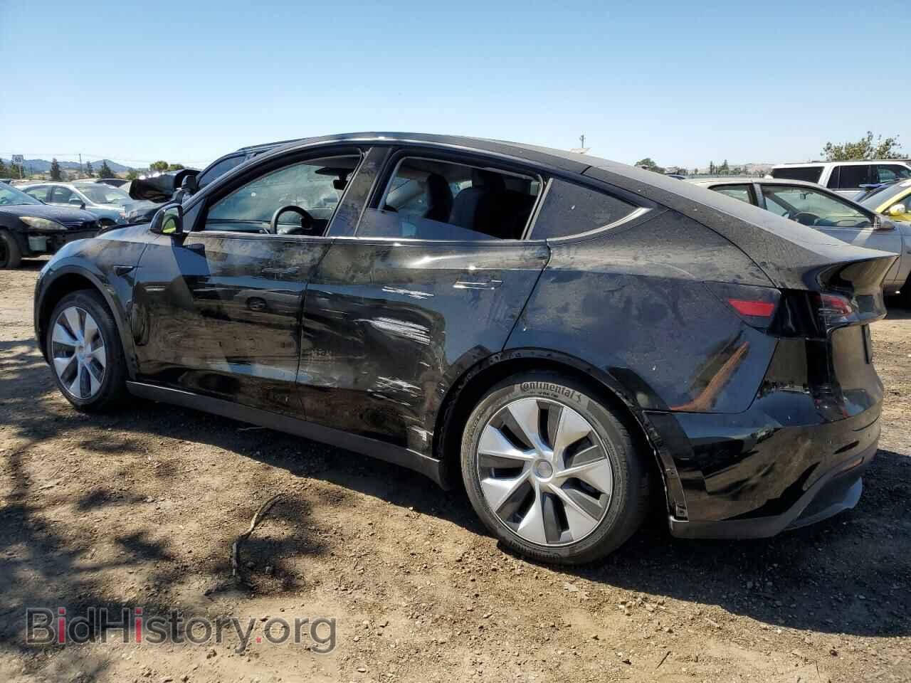 2023 TESLA MODEL Y - VIN: 7SAYGAEE2PF631212 - Фото 2