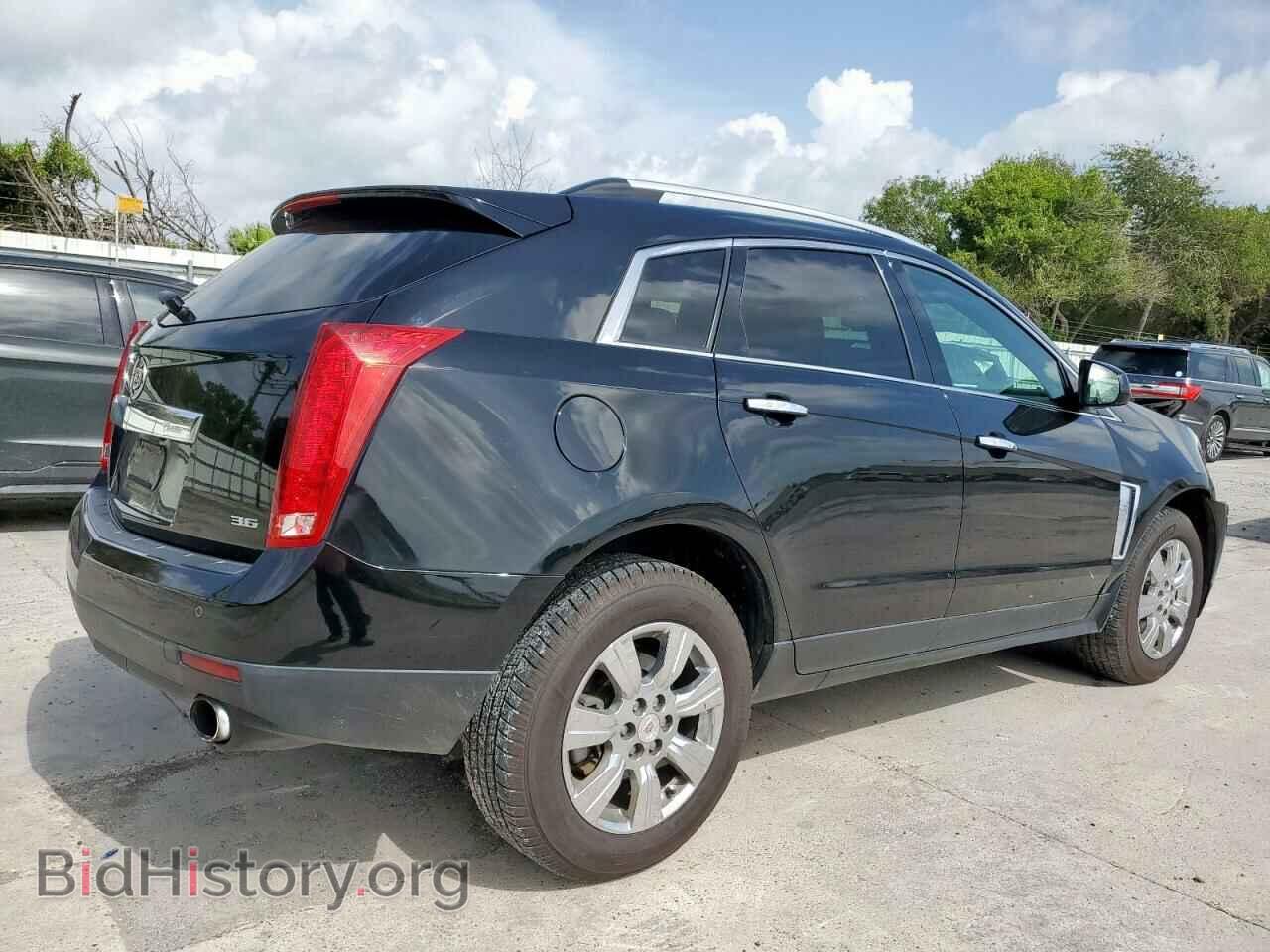 2014 CADILLAC SRX - VIN: 3GYFNBE39ES681750 - Фото 3