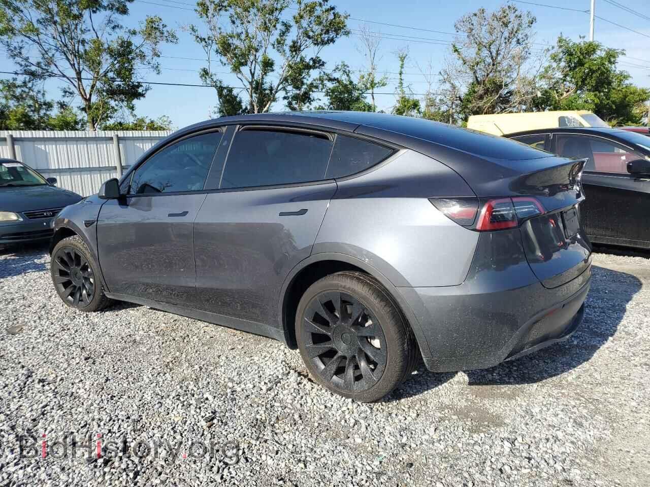 2023 TESLA MODEL Y - VIN: 7SAYGDEE1PF851166 - Фото 2