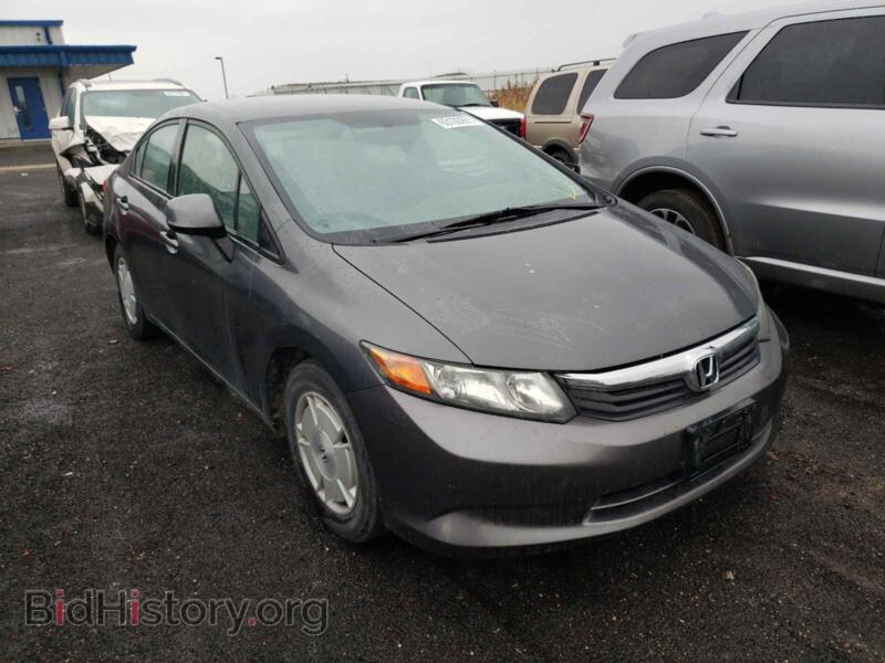 2012 Honda CIVIC Civic HF (VIN 2HGFB2F65CH517680) — photo 1 of 10, Copart, damage: side