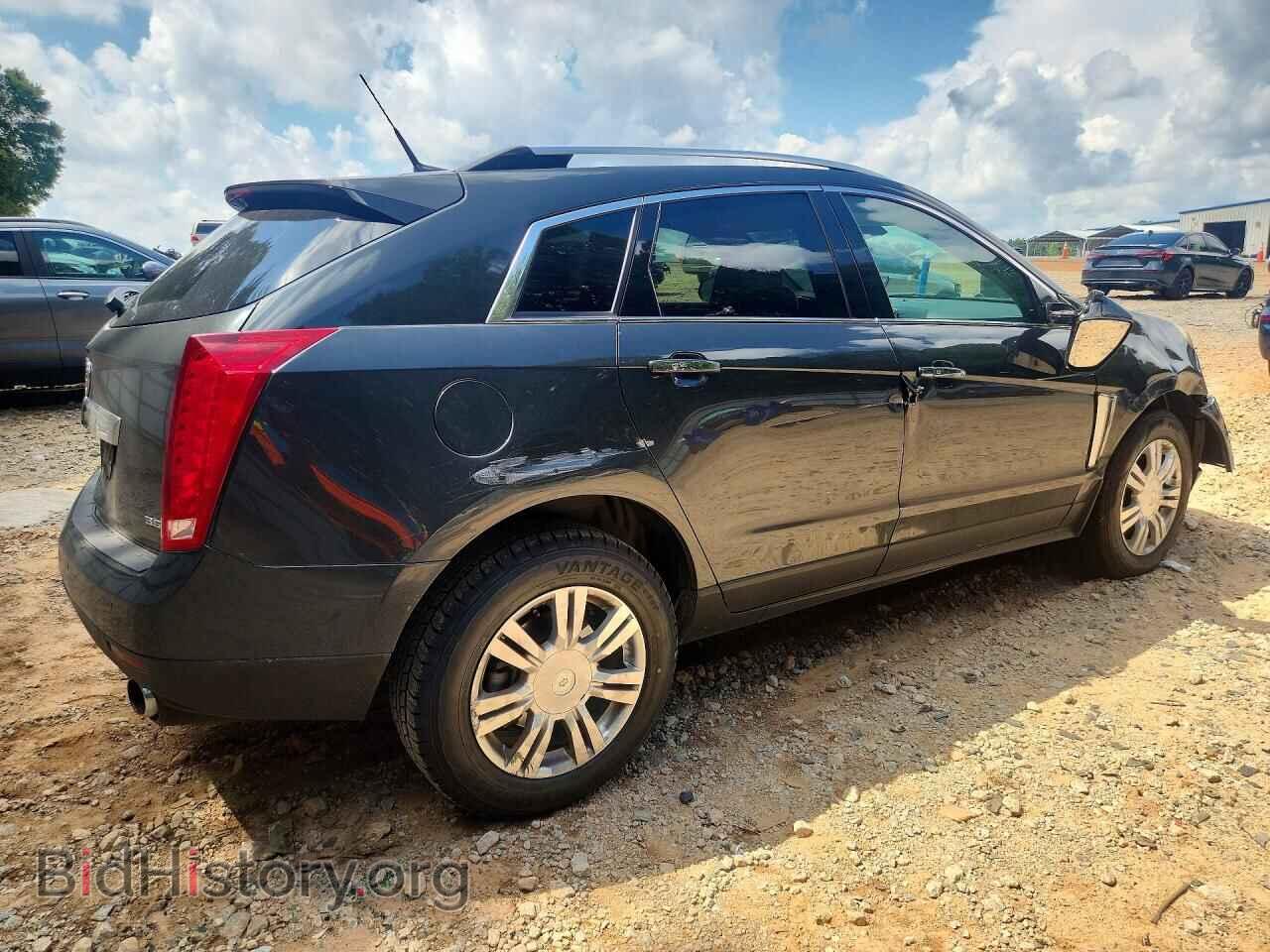 2014 CADILLAC SRX - VIN: 3GYFNBE38ES645211 - Фото 3