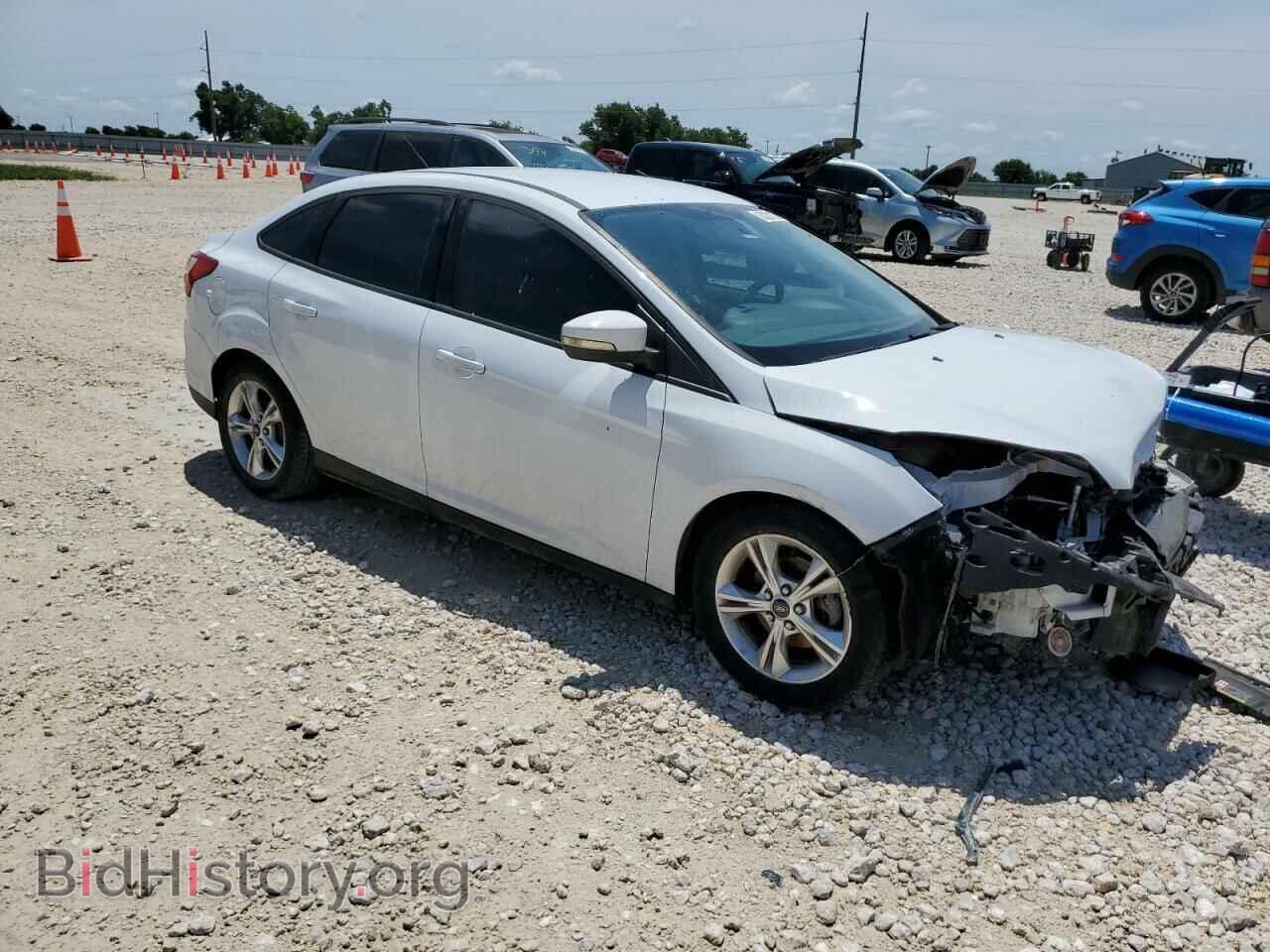 2014 FORD FOCUS - VIN: 1FADP3F21EL165817 - Photo 4
