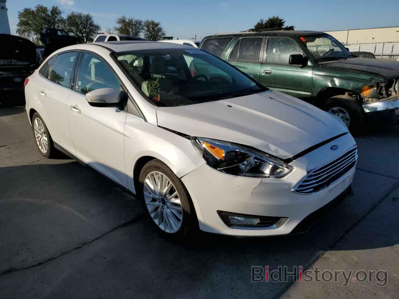 Фотография 1FADP3J27HL279994 - FORD FOCUS 2017